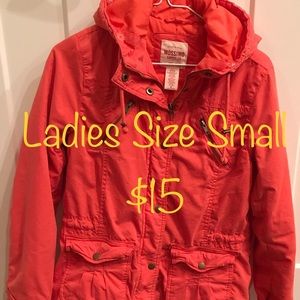 Ladies size small orange coat.